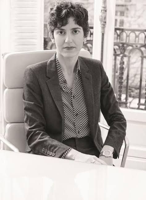 Francesca Bellettini photographed seated in an office interior