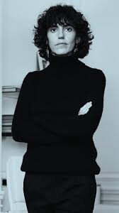Full-length black and white photograph of Francesca Bellettini
