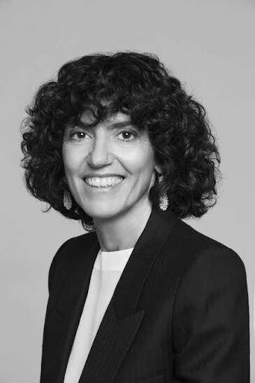 Black and white portrait of Francesca Bellettini against a plain background